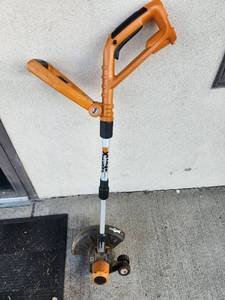 lot 317 image: WORX String Trimmer Edger Telescoping Shaft 120 Degree Pivot Handle