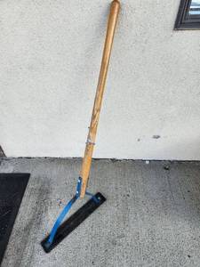 lot 320 image: True Temper Long Handle Serrated Blade Hand Tool with Blue Metal Brackets (Weed Wacker)