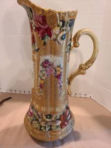 lot 1006 image: Antique Nippon porcelain pitcher handpainted, 16in tall, crack on inside is not visible on outside,  plus faux flowers