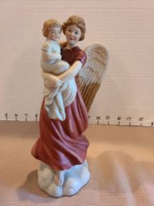 lot 1019 image: HOMCO Angel Figurine Holding Child Made in Thailand 1414, 8.25in tall