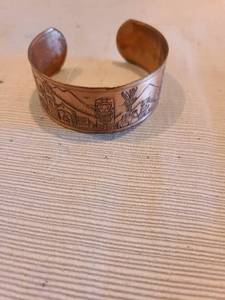 lot 1026 image: Solid copper cuff Mexican motif