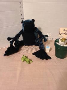 lot 1204 image: Plush frog and decor