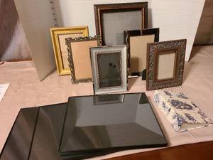 lot 1208 image: Picture frames and a small photo album