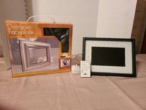 lot 1209 image: Digital photo frame with remote, plus a designer face plate