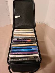 lot 1218 image: CDs in zippered carry case