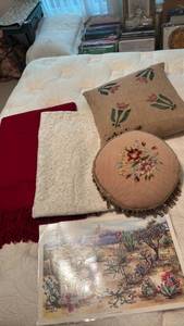 lot 1328 image: Cross Stitch and Tulip Throw Pillows, One Lace Curtain Panel 74x56 and Red Fringe Throw