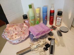 lot 1408 image: Hair Care Lot Wahl Trimmer, Finesse Hairspray, Sun Bum, Love Beauty and Planet