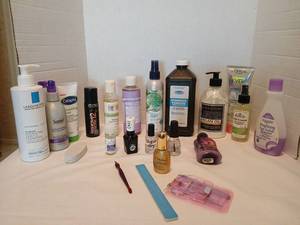 lot 1412 image: Mixed Personal Care Lot La Roche-Posay Suave Cetaphil Redken hairspray  Sally Hansen nail polish
