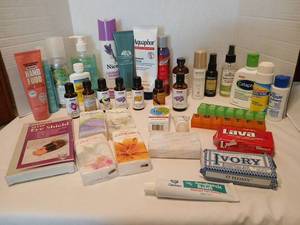 lot 1416 image: Mixed Personal Care Lot NOW Essential Oils Aquaphor Ivory Lava Sofitelle Tissues