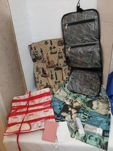lot 1502 image: Protocol Hanging Toiletry Organizer Lot with Jewelry Roll and Elvis Tote
