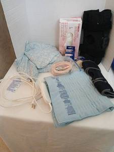 lot 1503 image: SoftHeat Auto Shut-Off Heating Pad Lot with Knee Brace and Mediguard Gloves