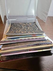 lot 3113 image: Storage container with scrapbooking paper