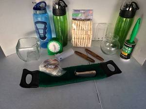 lot 3214 image: Glass vases, water bottles, kitchen timer, shoe care, more.