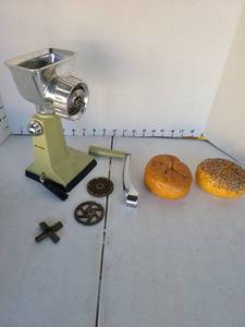 lot 3228 image: Rival Grind-o-Mat 303 and 2 faux kaiser rolls