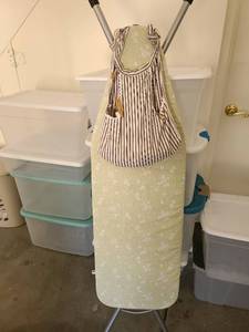 lot 3300 image: Ironing board with bag of clothespins