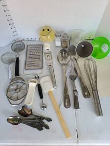 lot 3310 image: Happy face nightlight and kitchen utensils.