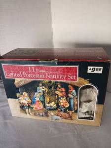 lot 3516 image: Lighted Porcelain Nativity Set 11 Piece with Wooden Manger