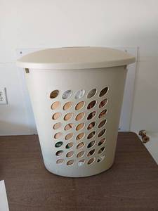 lot 3602 image: Sterilite Laundry Hamper with Lidand miscellaneous  plastic and paper bags