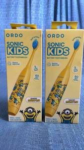lot 3026 image: ORDO Sonic Kids Battery Toothbrush Minions 2 Brush Heads Lot of 2