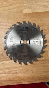lot 106 image: Ryobi 7 14 in. 24 Tooth Circular Saw Blade 58 in. Arbor - Retail $20