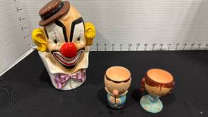 lot 1024 image: Clown vase and wood egg cups