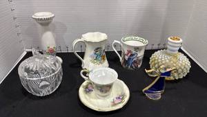 lot 1039 image: Blue Sky candle holders, decorative coffee cups, lead crystal jelly jar, hobnail cologne bottle needs new cork) and angel