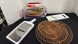 lot 1053 image: Microwave corn steamer new, cheese shredders look new and 3 tier wire basket