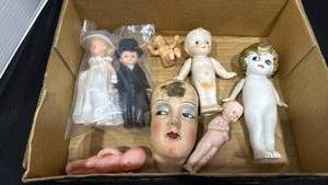 lot 1076 image: Madame Alexander bride and groom, Kewpie dolls and doll head