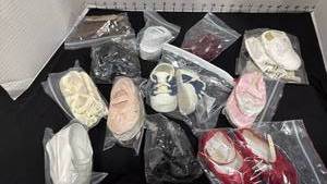 lot 1082 image: Doll shoes