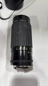 lot 1095 image: Sigma Zoom 35 mm lense with case