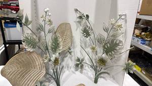 lot 1103 image: Metal flower decor 22x22 one leaf need needs attached