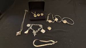 lot 1226 image: Womens jewelry including watches and charm bracelet