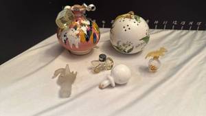 lot 1261 image: Potpourri balls, small perfume bottles and stoppers
