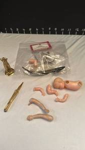 lot 1267 image: Doll shoes, doll parts and more