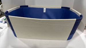 lot 2002 image: Michael Graves basket with handles 8x22x18