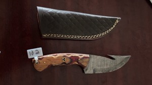 lot 102 image: Handmade Damascus Steel 109515N20 4 Gut Hook Hunting Knife with Leather Sheath