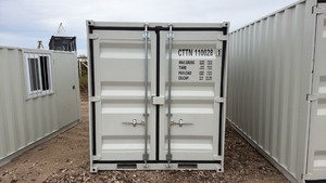 lot 52 image: Unused 11ft Modified Shipping Container with Side Door and Window CTTN 110028