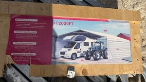 lot 1023 image: Unused SD LAUNCH 20x30 ft Carport with Walls - Box Damaged