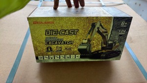 lot 1148 image: Unused SDLANCH 124 Die-Cast Remote Control Excavator 6 Channel RC