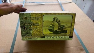 lot 1149 image: Unused DSLANCH Die-Cast Remote Control Excavator 124 6 Channel RC