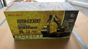 lot 1150 image: Unused SDLANCH 124 Die-Cast Remote Control Excavator 6 Channel RC