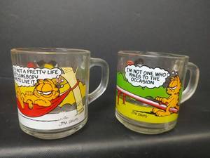 lot 12 image: Vintage McDonalds Garfield Glass Mugs