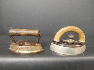 lot 17 image: 2 Vintage Small Sad Irons with Wood Handles