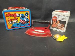 lot 26 image: Vintage Marvel Captain America Small Lunch Box, Coca-Cola Tin, and VTG Metal Childs Iron with Wood Handle