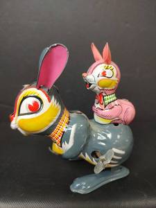 lot 40 image: Vintage Light Metal Rabbit Toy with Pink Rabbit Rider and Winding Key
