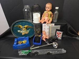 lot 163 image: Assorted Household and Collectibles Dolls, Acid Cigars Ashtray, DeWalt Pouch, Jar, Lg Cable Ties, and More