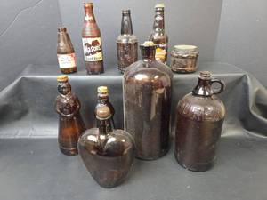 lot 165 image: Brown Glass Bottles