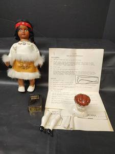 lot 241 image: 12 inch Doll Parts with Body and Dress Instructions, Indian Doll and Holy Bible Box