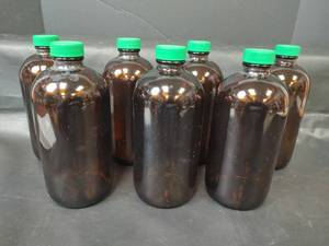 lot 308 image: Vintage Brown 16 oz Glass Science Bottles with Plastic Caps