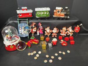 lot 336 image: Vintage Felt Flocked Santa Claus Ornaments, Ceramic Train with More Holiday Decor